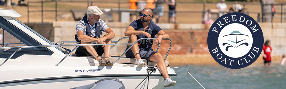 Two men sitting on a boat